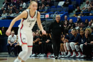 Geno Auriemma watching Paige Bueckers from the sideline. (Image Credits: David Butler II, Imagn)